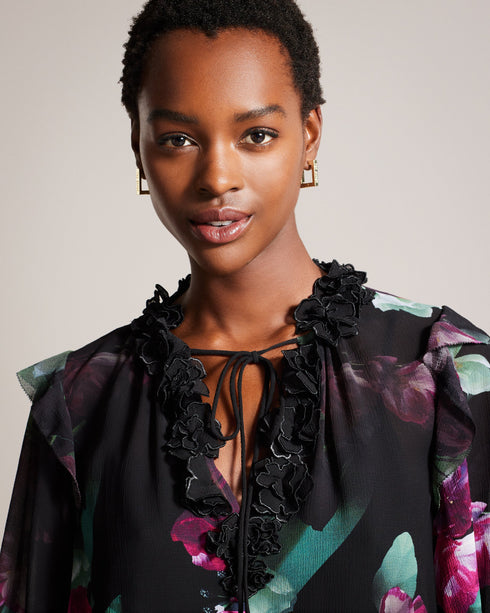 FAIZIAA-Tops-Romance meets effortless glamour in FAIZIAA. Half-length blouson sleeves create a relaxed and feminine look that's perfect for sunny days, while the flower appliqués bring an extra dose of femininity. V-neck top Neck tie Trailing floral print Half length blouson sleeves Cami lining with adjustable straps Flower appliqués- Ted Baker Romania